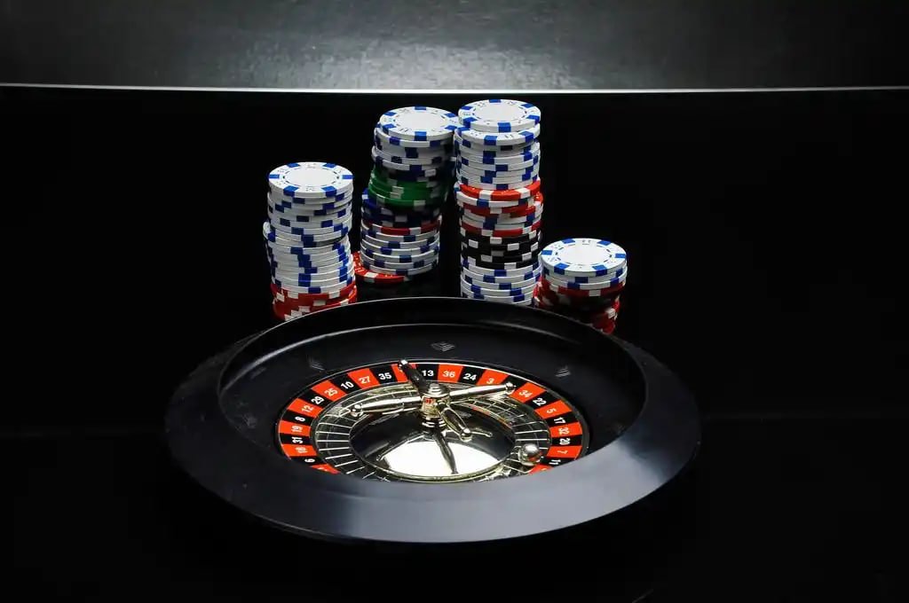 Live dealer table with multiple-camera broadcast and game interface